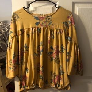 Cute yellow blouse with colorful printed flowers!